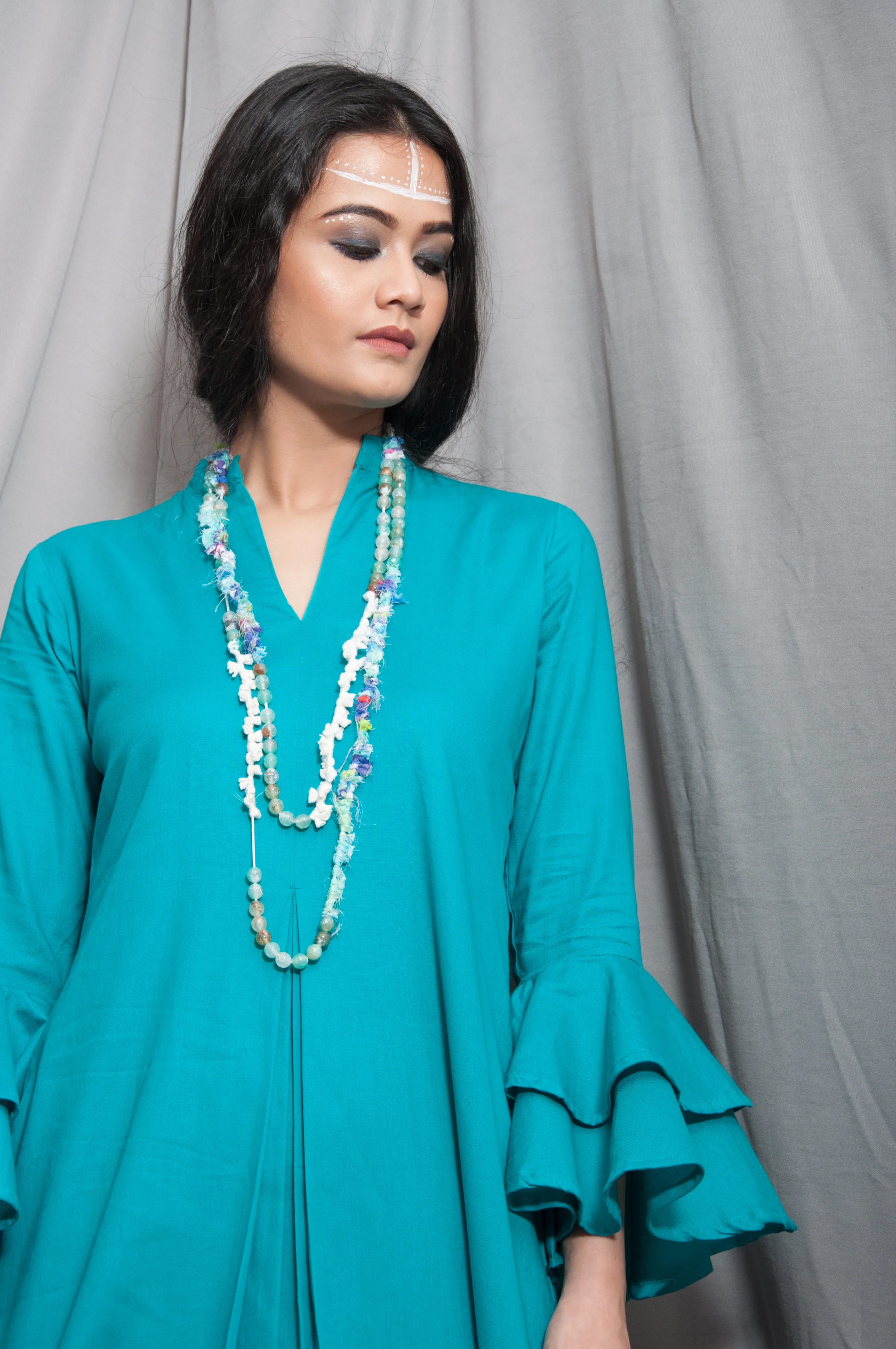Essence- Turquoise Blue Cowl Dress With Necklace & Bell Sleeve - Image 4